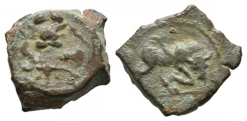 EBUSUS (Ibiza). 1/8 Calco. (Ae. 1,30g/11mm). 200-100 a.C. (FAB-924). Anv: Bes co...