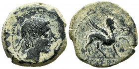 Kastilo-Castulo. Unit. 180 a.C. Cazlona (Jaén). (Abh-701). (Acip-2143). Anv.: Diademed male head to right, in front of hand. Rev.: Sphinx on the right...
