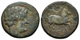 Kese. Half unit. 220-200 BC. Tarragona. (Abh-2300). Anv.: Male head right. Rev.: Horse leaping right, caduceus above, iberian legend KESE below. Ae. 7...