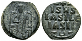 Constantine IX Monomachus. Follis. 1050-1060 AD. Constantinople. (Doc-IIIb pp. 685/687). Anv.: Christ seated facing on throne with back, wearing nimbu...