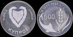 CYPRUS: 500 Mils (ND 1981) in copper-nickel commemorating the World Food Day with shielded arms within wreath on obverse. Denomination divides swordfi...