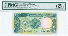 SUDAN: 1 Pound (1987) in green and blue on multicolor unpt with cotton boll at left and outline map of Sudan at center. S/N: "C/350 430863". WMK: Arms...