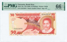 TANZANIA: 50 Shilingi (ND 1986) in red-orange and light brown on multicolor unpt with Arms at top center and President Ali Hassan Mwinyi at right. S/N...