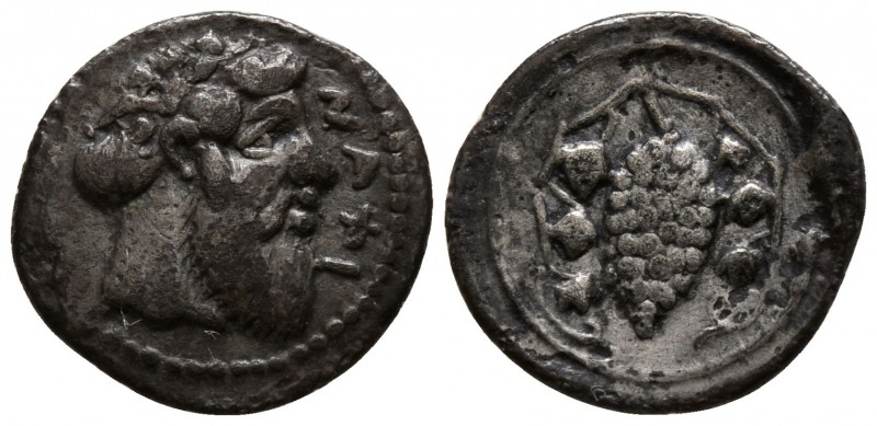 Sicily. Naxos circa 461-430 BC.
Litra AR

11mm., 0,59g.

Head of Dionysos r...