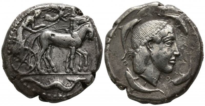 Sicily. Syracuse 466-460 BC.
Tetradrachm AR

25mm., 16,52g.

Charioteer dri...