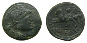Ikalkusken (Iniesta, Cuenca). Siglo II aC. As. AE. Anv.: Cabeza masculina, delfín detrás. Rev.: Jinete a izquierda con lanza y escudo, leyenda debajo....