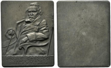 Giosuè Carducci (poeta e scrittore) (1835-1907) Placchetta uniface (opus: Alberti) (mm. 60x48). Carducci in poltrona con bastone. PB - SPL