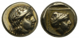 Greek
Lesbos, Mytilene EL Hecte. Circa 377-326 BC. 2.56gr. 10.1mm.
Laureate head of Apollo right; small coiled serpent behind / Head of female right, ...