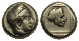 Greek
LESBOS. Mytilene. Ca. 388 BC. Electrum hecte 2.51gr. 10.2mm.
 Head of Artemis-Cybele right, wearing stephane ornamented with palmettes / Caricat...