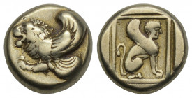 Greek
Lesbos, Mytilene. Electrum Hekte ca. 412-378 BC. 2.48gr. 10.7mm.
 Forepart of winged lion left. rev. Sphinx seated right in linear square within...