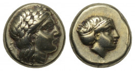 Greek
Lesbos. Mytilene 377-326 BC. Hekte EL 2.53gr. 10.2mm.
Laureate head of Apollo right / Head of female right, hair in sakkos; small coiled serpent...