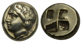 Greek 
Ionia. Phokaia 380-360 BC. Hekte EL 2.51gr. 10.6mm.
Head of female left, wearing cross formed earring / Quadripartite incuse square. good very ...