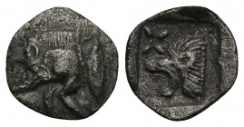 Greek
MYSIA, Kyzikos. Circa 450-400 BC. AR Hemiobol 0.37gr. 9.3mm.
Forepart of boar left; to right, tunny upward / Head of roaring lion left; star t...