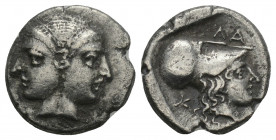 Greek 
MYSIA, Lampsakos. 4th-3rd centuries BC. AR Diobol(?). 1.6gr. 12.3mm.
Janiform female heads, each wearing diadem / Helmeted head of Athena right...