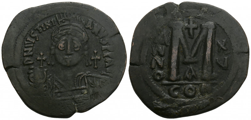 Byzantine 
Justinian I AD 527-565. Constantinople Follis Æ 22.2GR. 39.7MM.
Helme...