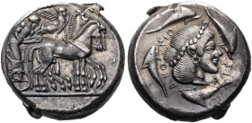 Sicily. Syracuse. Deinomenid Tyranny, 485-466 BC. Tetradrachm (Silver, 25 mm, 17.14 g, 12 h), 475-470. Male charioteer, wearing a long chiton and hold...