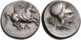 Akarnania. Leukas. Circa 405-345. Stater (Silver, 20 mm, 8.59 g, 12 h). Pegasus flying right with curved wing; below, Λ. Rev. Helmeted head of Athena ...