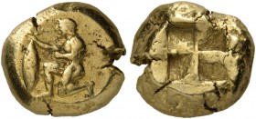 Mysia. Kyzikos. Circa 500-450 BC. Stater (Electrum, 18 mm, 16.15 g). Nude male figure kneeling to left, holding a tunny by the tail with his right han...