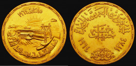 Egypt Five Pounds Gold AH1384 (1964) Diversion of the Nile - Opening of the Aswan Dam KM#408 EF/GEF and lustrous, a very pleasing example of this popu...