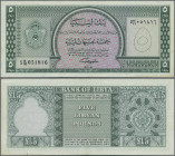 Libya: Bank of Libya 5 Pounds L.1963, P.31, very nice condition with a few folds and lightly stained paper at lower margin, Condition: VF.
 [plus 19 ...