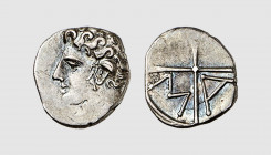 Gallia. Massalia. 215-200 BC. AR Obol (0.61g, 6h). Obverse die signed by the master PAR... LT 687; MHM 20. Lightly toned. A lovely coin. Choice extrem...