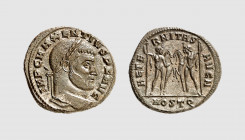 Empire. Maxentius. Ostia. AD 309-312. Æ Follis (6.55g, 6h). Cohen 5; RIC 35. Dark brown patina. Traces of silvering. Choice extremely fine. From a pri...