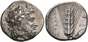 LUCANIA. Metapontum. Circa 340-330 BC. Didrachm or nomos (Silver, 20 mm, 7.88 g, 7 h), signed by the Kal... engraver. Laureate head of Zeus to right; ...