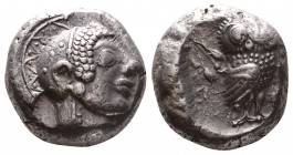 Attica, Athens AR Tetradrachm. Circa 490-482 BC. Exceptionally large Archaic head of Athena right wearing full crested helmet decorated with chevron a...
