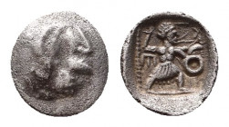 UNCERTAIN LEVANTINE. 4th century BC. AR Tetartemorion 7mm, 0.2 g, 10h). Janiform head of Silenos on left, satyr on right, with a third face facing upw...