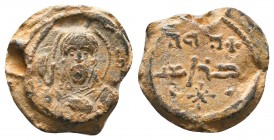 An interesting seal with a prelate saint and Arabic inscription
(ca 11th cent.)

Obverse: Facial bust of a bishop saint in prelate's garments, with...