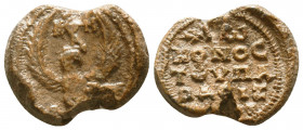 Byzantine lead seal of Conon Papasizos officer
(7th cent.)

Obverse: Eagle with open raised wings to right, cruciform invocative monogram over its ...