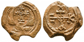 Byzantine lead seal of N. officer
(7th cent.)

Obverse: Eagle with open raised wings to right, cruciform invocative monogram over its head, ΘΕΟΤΟΚΕ...