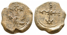 Byzantine lead seal Menelaos honorary eparch
(7th cent.)

Obverse: Eagle with open raised wings to right, cruciform invocative monogram over its he...