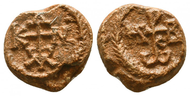 Byzantine lead seal of Constantinos scribon
(7th cent.)

Obverse: Cruciform m...