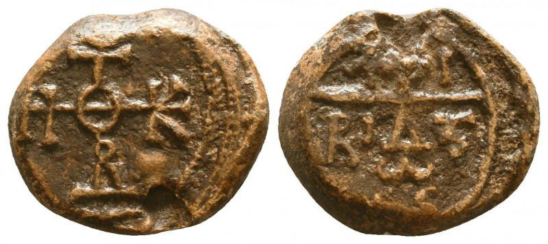 Byzantine lead seal of N. officer
(7th cent.)

Obverse: Cruciform invocative ...