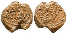 Byzantine lead seal of Anastasios patrikios
(7th cent.)

Obverse: Inscription in 3 lines, [+A]NACT/ACIOY/+ (of Anastasios), wreath border.

Rever...