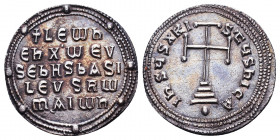 Byzantine Coins, 7th - 13th Centuries
Leo VI AR Miliaresion. Constantinople, AD 886-908. IhSVS XRISTVS hICA, cross potent set on three steps atop glo...
