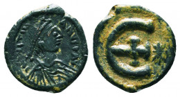 Byzantine Coins, 7th - 13th Centuries
Justinian I. A.D. 527-565. AE 
Condition: Very Fine

Weight: 2.2 gr
Diameter: 16 mm