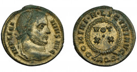 IMPERIO ROMANO. LICINIO I. Follis. Aquileia (320-321). R/ Láurea rodeando VOT/ XX. Exergo AQS. AE 2,93 g. 19 mm. RIC-67. R.P.O. EBC-.