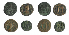 IMPERIO BIZANTINO. Lote de 4 monedas de bronce, 2 de ellas con sobre de compra de Jesús Vico (1991). De BC a MBC.