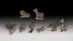 ROMA. Imperio Romano. Lote de ocho figuras (I-IV d.C.). Bronce. Diversas figuras zoomorfas. Altura 1,6-2,6 cm..