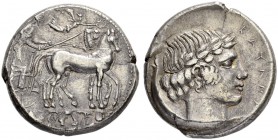 SICILY. Catane. Tetradrachm c. 450. Obv. Slow quadriga to r., the driver, wearing long chiton, holding the reins with his r. hand, the kentron with hi...