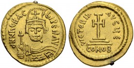 Heraclius, 610-641. Solidus 610/613, Constantinopolis. Officina Є. Obv. Draped and cuirassed bust with short beard wearing plumed helmet, pendilia and...