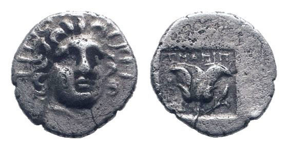 ISLANDS of CARIA.Rhodos. Circa 205-190 BC.AR Hemidrachm.Head of Helios facing sl...