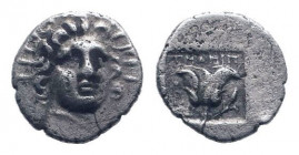 ISLANDS of CARIA.Rhodos. Circa 205-190 BC.AR Hemidrachm.Head of Helios facing slightly right / Rose with bud to left; torch to right.HGC 6, 1462-1463....