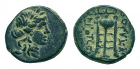 SYRIA.Seleucis and Pieria.Antiochos II . 261-246 BC.Sardes mint.AE Bronze.Laureate head of Apollo right / ΒΑΣΙΛΕΩΣ ANTIOXOY, Tripod; monograms to oute...