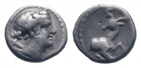IONIA.Ephesos .Circa 250-200 BC.AR Obol. Draped bust of Artemis right, quiver at shoulder / Forepart of stag kneeling right, head left. Good very fine...