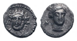 CILICIA.Nagidos. Circa 400-380 BC. AR Obol . Head of Aphrodite facing slightly right, hair in sphendone / Head of youthful Dionysos facing slightly le...