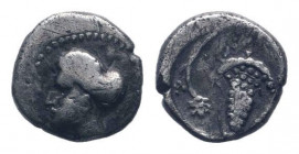 CILICIA.Soloi.Circa 410-375 BC. AR Obol.Helmeted head of Athena left / Grape bunch with tendril; M-O across field. SNG France 184-7 var; SNG Levante 4...