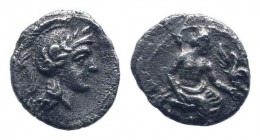 CILICIA.Uncertain mint.Circa 400-300 BC.AR Obol. Helmeted head of Athena right / Baaltars seated right, holding lotus-tipped sceptre with right hand; ...